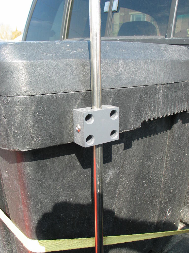 A block of PVC plastic attaches the 1/2" stainless steel tubing to the tool box