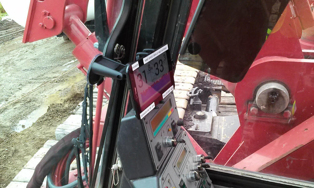 A dash mount attached the touch screen tablet for in-cab display and cellular communications