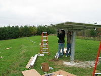 Assembling the 1kW solar array on Uni-Rac top of pole mount