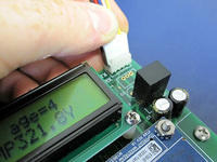 Updating Firmware: Closeup of in-circuit programming connector