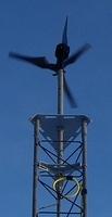 Example of APRS World WT10 Wind Turbine Mounted to Rohn 45G Tower Using Top Plate