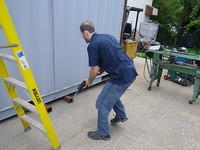 Ted cutting the container to 8' long